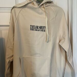Authenticic Taylor Swift beige sweatshirt. Never worn. Size medium. Runs big.